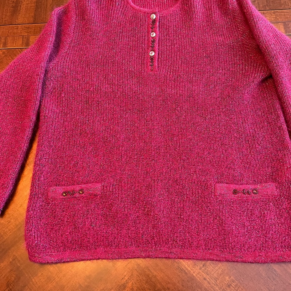 Sparkle sweater, size 50 (European size).  Runs big.  In excellent condition.